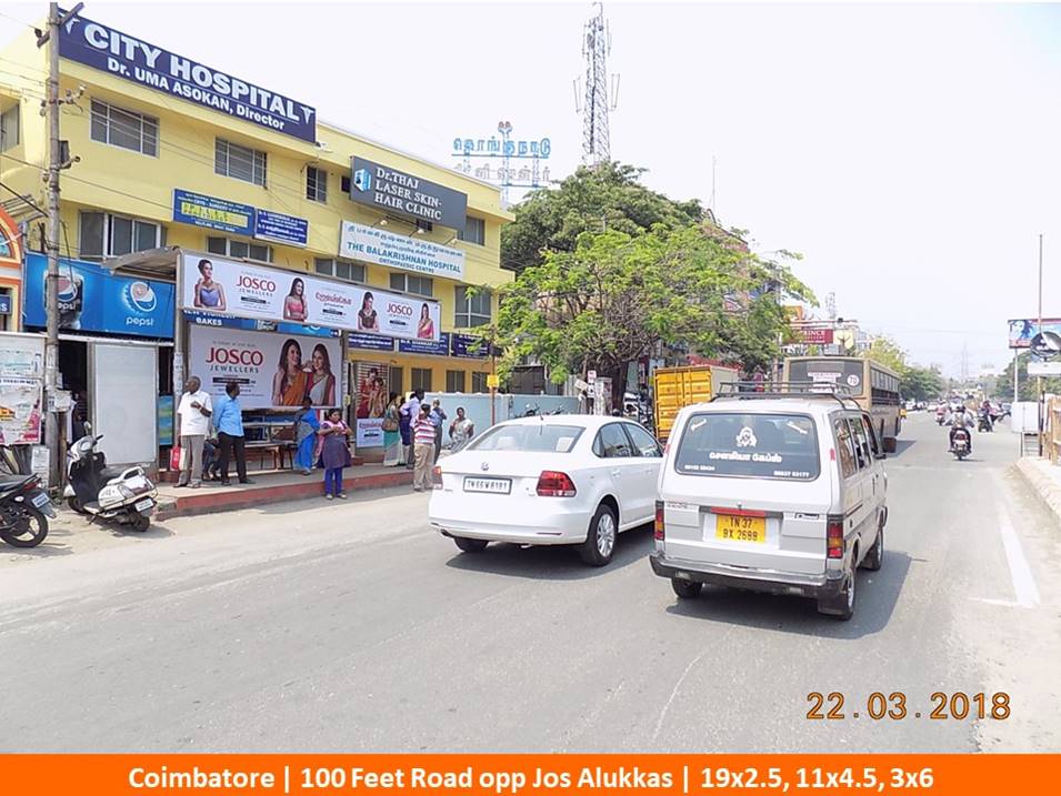 OOH Hoardings Agency in India, BQS Advertising rates at 100 Feet Road Near Jos Alukkas in Coimbatore, Tamil Nadu 